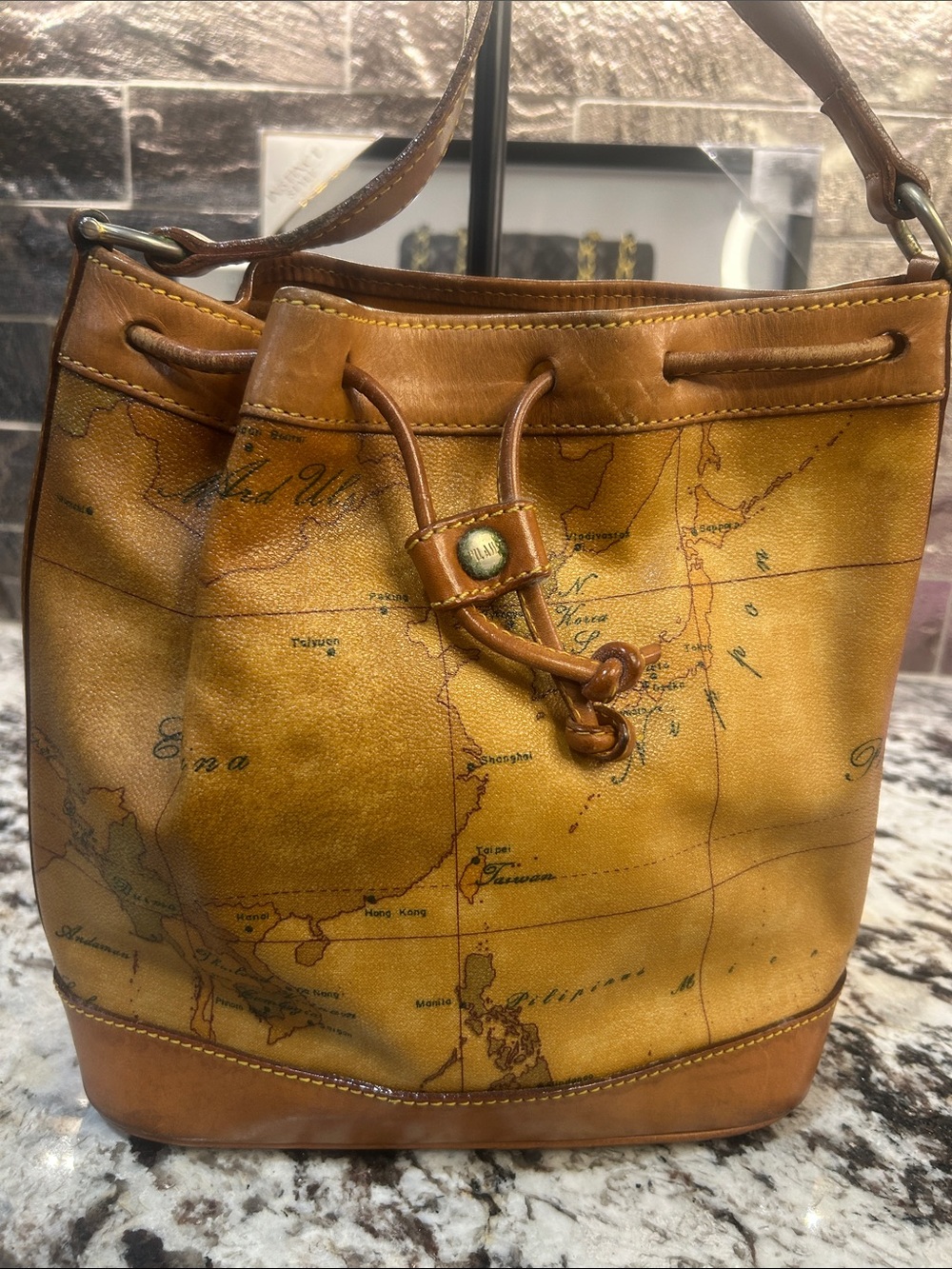 Alviero Martini Tan and Brown Map-Print Leather Drawstring Bucket Bag